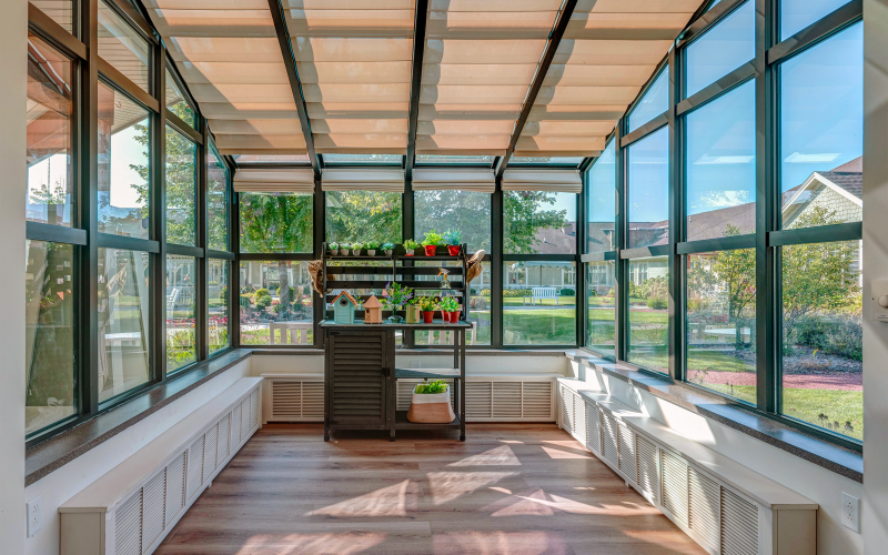 Greenhouse with plants and glass walls