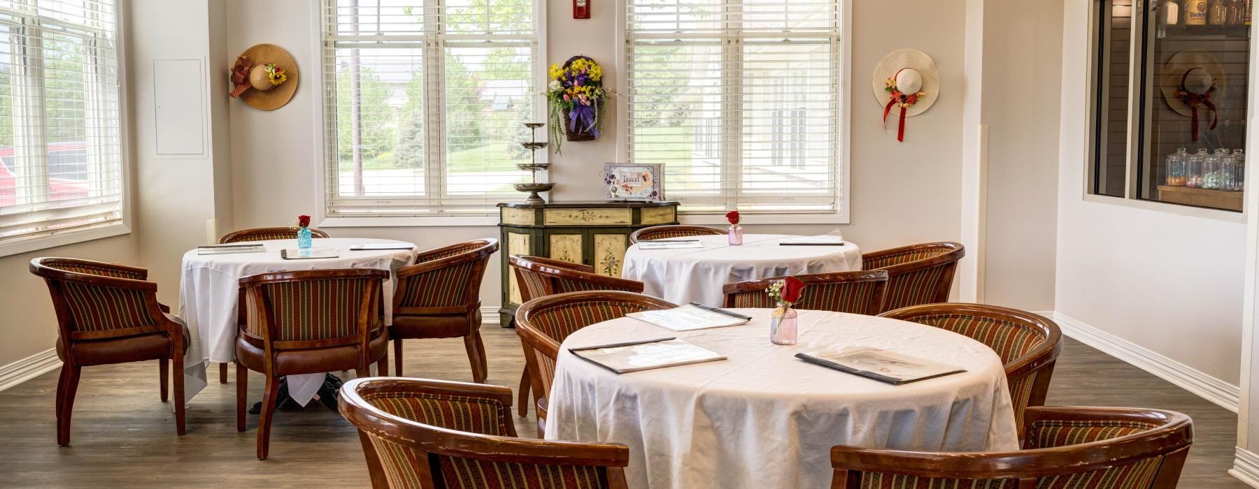 a large room with tables and chairs