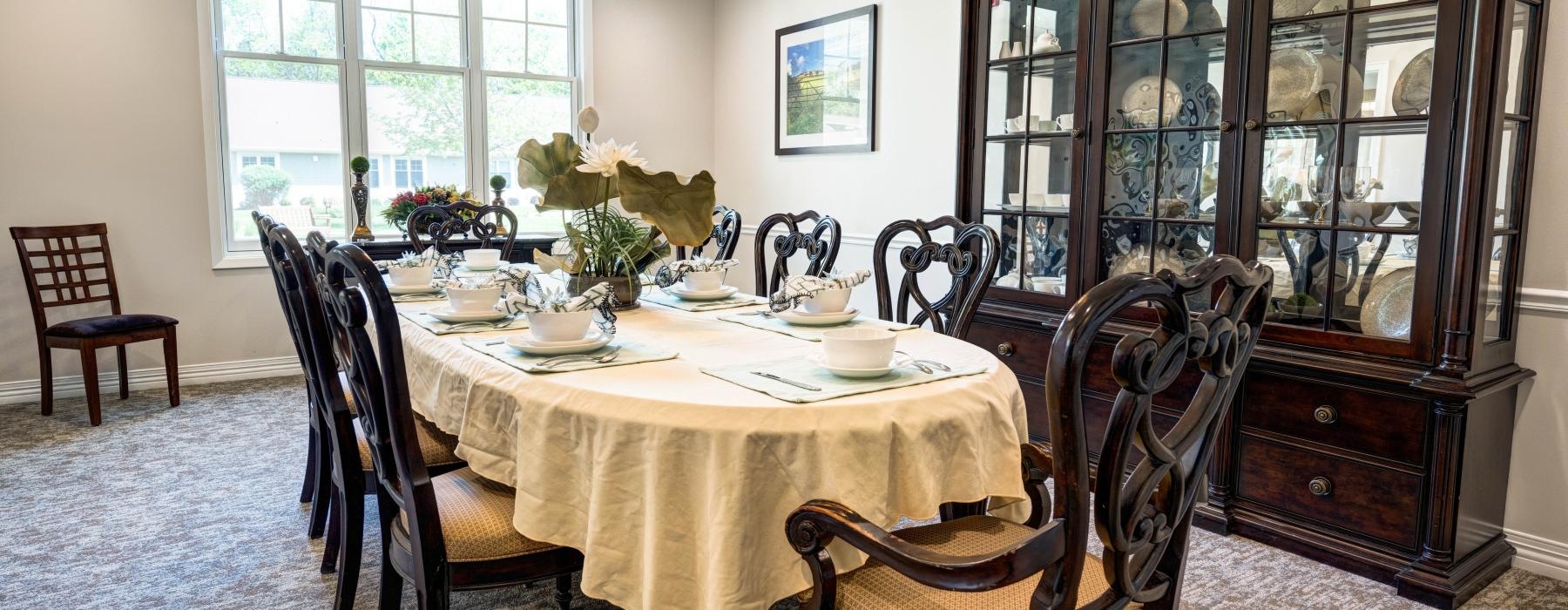 a dining table with chairs around it